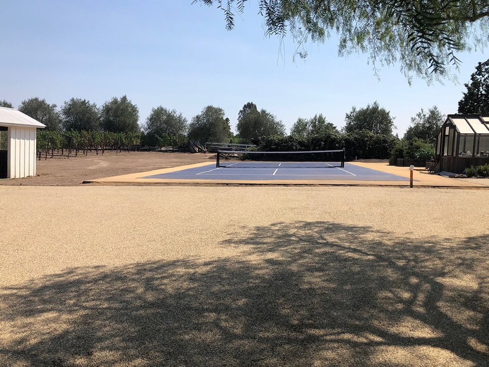 Paved Pickle Ball Court and Gold Chip Seal parking area